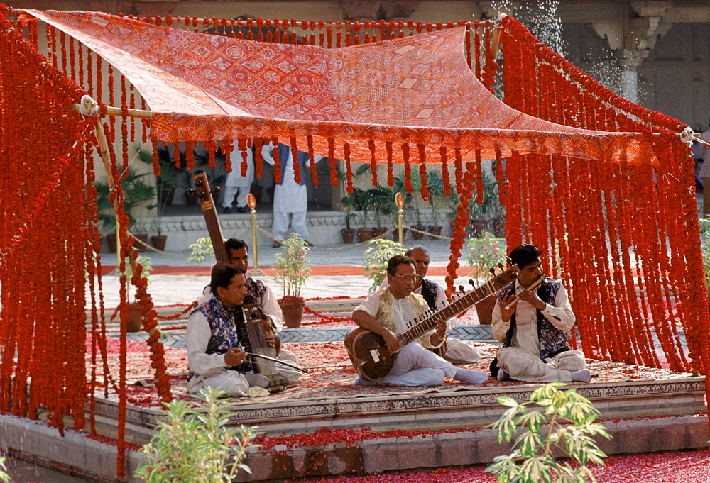 Musical band playing traditional instruments at festival in Lahore, Pakistan