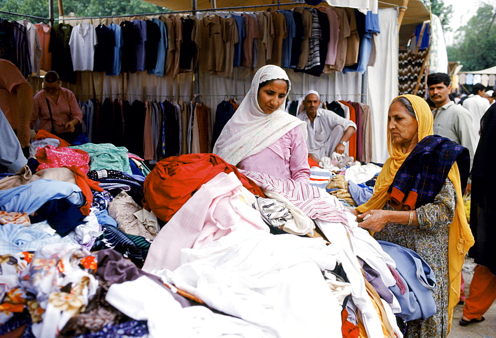 Pakistani women shopping for clothes in the souk in Islamabad, Pakistan