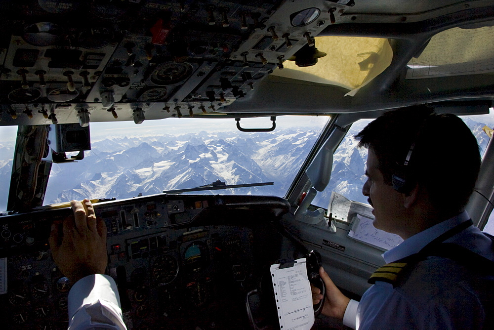 Pilots flying 737 jet airplane over Karokoram mountains above Skardu Valley in Northern Pakistan