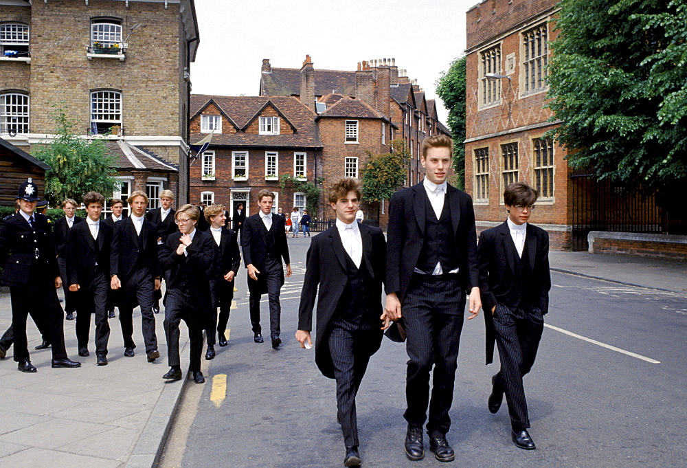 Eton schoolboys in traditional tails at Eton College, England, UK