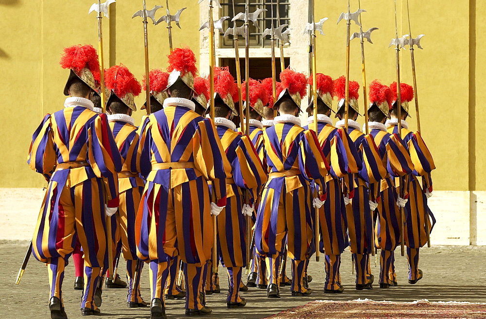 Swiss ceremonial guards in traditional striped uniforms at the Vatican, Vatican city