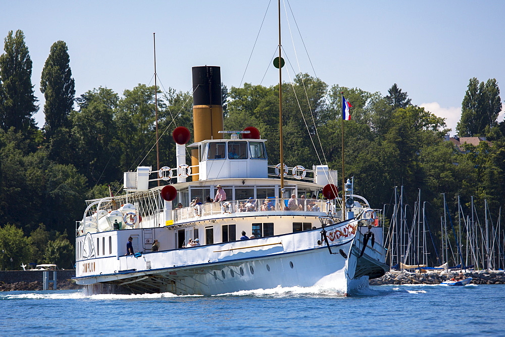 Old paddle steamer ferry crosses Lac Leman (Lake Geneva), from Evian-les-Bains, Rhone-Alpes, France, Europe