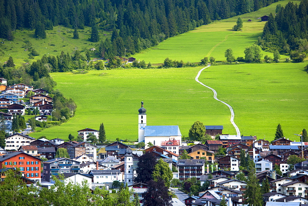 Church and village of Flims in mountain pass in the Graubunden region of Switzerland, Europe