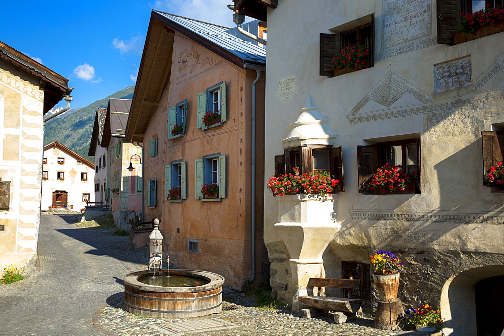 In the Engadine Valley the village of Guarda with old painted stone 17th century buildings, Graubunden, Switzerland, Europe