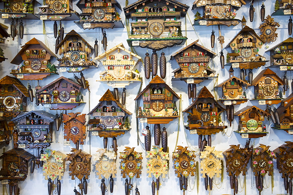 Traditional cuckoo clocks on sale in Geschenkehaus shop in the town of Seefeld in the Tyrol, Austria, Europe