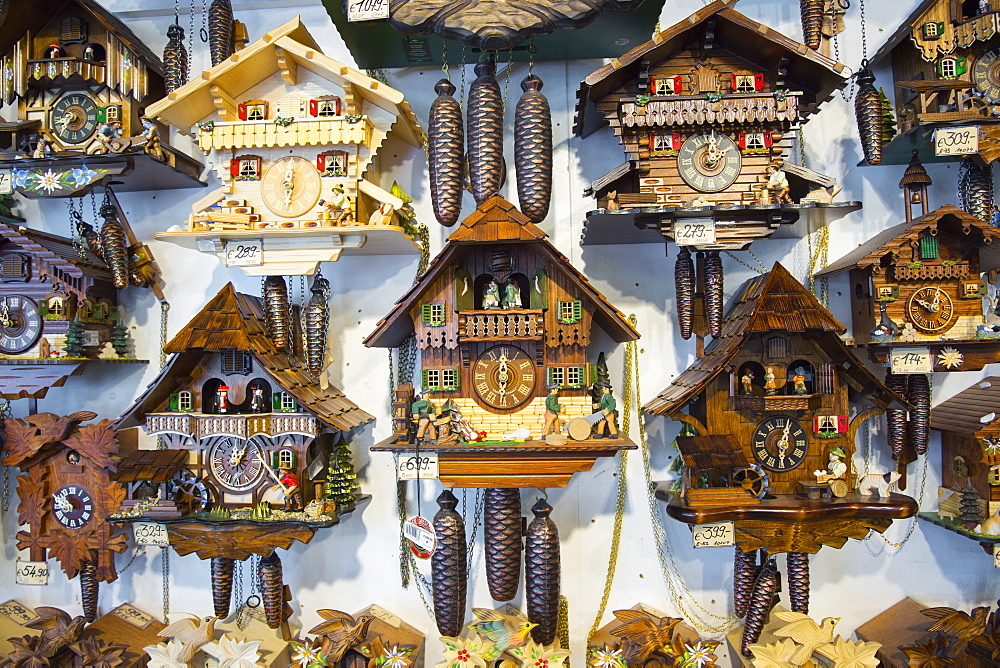 Traditional cuckoo clocks on sale in Geschenkehaus shop in the town of Seefeld in the Tyrol, Austria, Europe