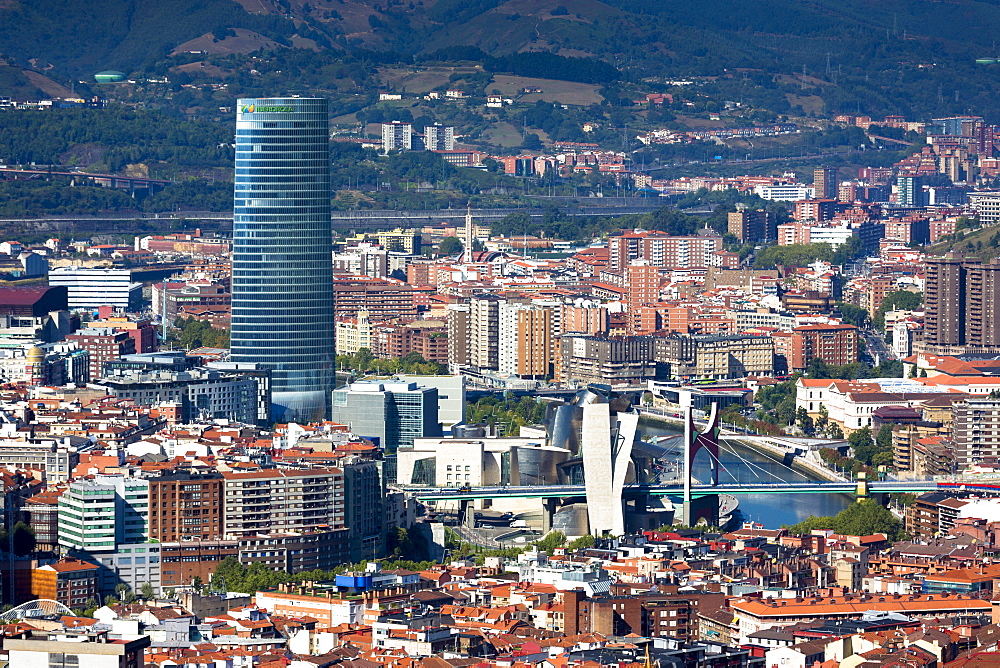 Aerial view of Guggenheim Museum, Iberdrola Tower skyscraper and Red Bridge in Bilbao, Basque country, Euskadi, Spain, Europe