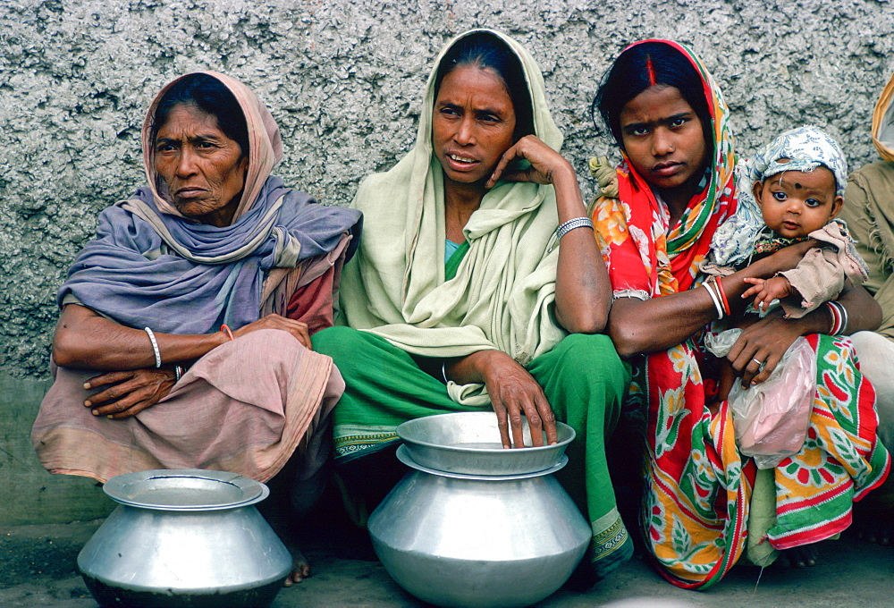 Woman queuing for food at Mother Teresa's Mission in Calcutta, India