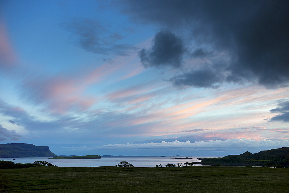 Panoramic sky of pink and blue pastel colours over Loch Na Keal at sunset on the Isle of Mull, Inner Hebrides, Western Isles, Scotland, United Kingdom, Europe