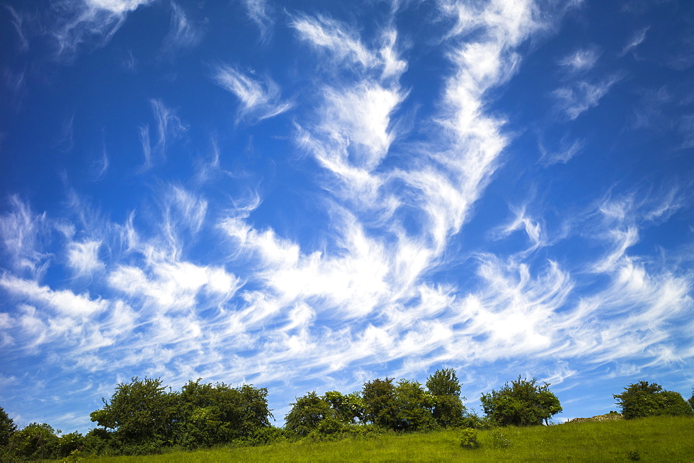 Cirrus clouds in blue sky, United Kingdom, Europe