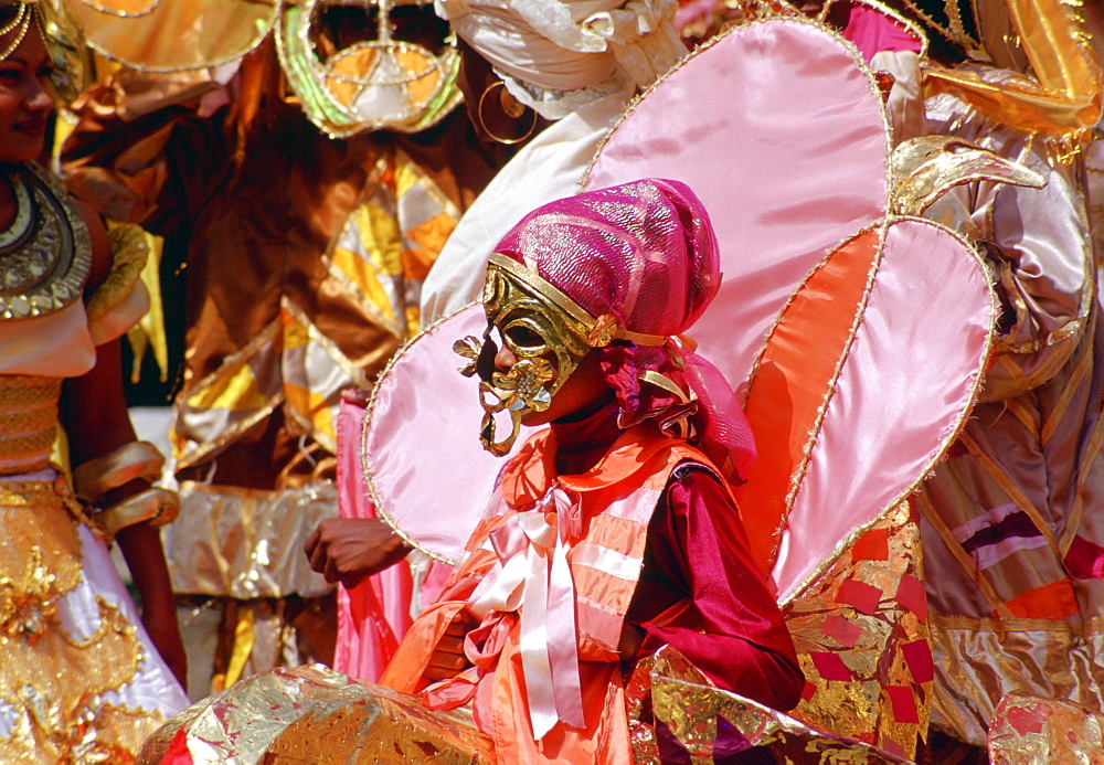 Dancers in ornate colourful national costumes at a carnival in Trinidad