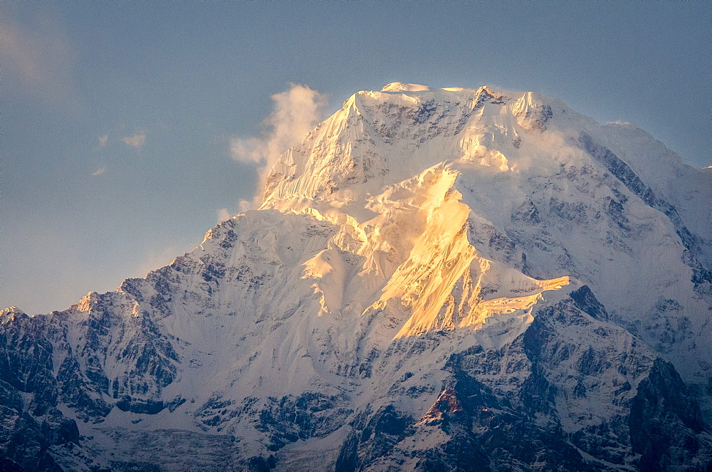 The evening sun on Annapurna South, 7219m, Annapurna Conservation Area, Nepal, Himalayas, Asia 