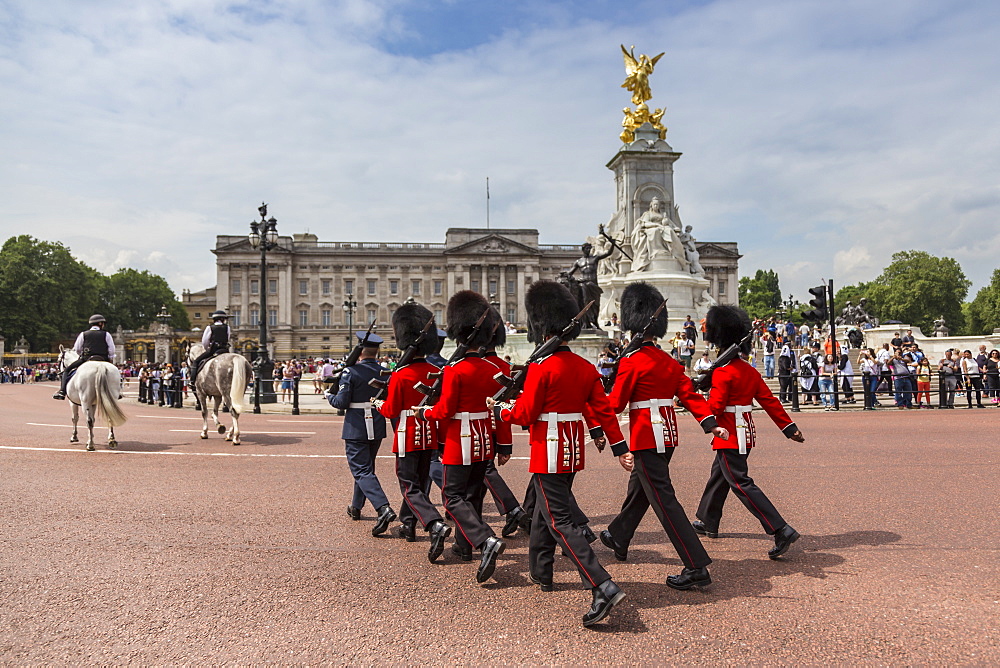 Changing the Guard at Buckingham Palace, New Guard marching, colourful spectacle and British pageantry, London, England, United Kingdom, Europe