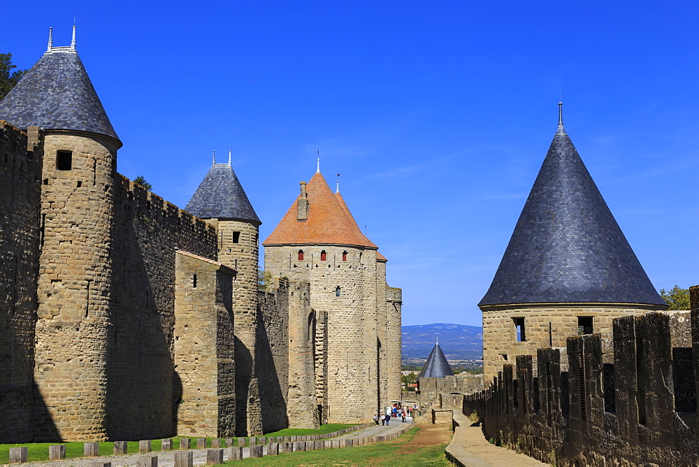 La Cite, battlements and spiky turrets from Les Lices, Carcassonne, UNESCO World Heritage Site, Languedoc-Roussillon, France, Europe