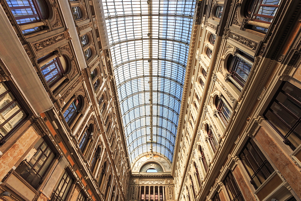 Morning light illuminates the Galleria Umberto I arcade, 1890, through its spectacular glass vaulted roof, City of Naples, Campania, Italy, Europe