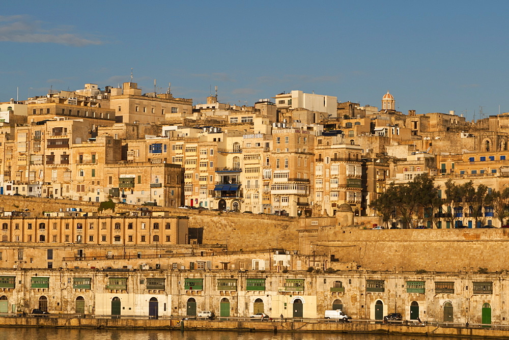 View of the old town from the Grand Harbour in the golden early morning, Valletta, Malta, Europe 