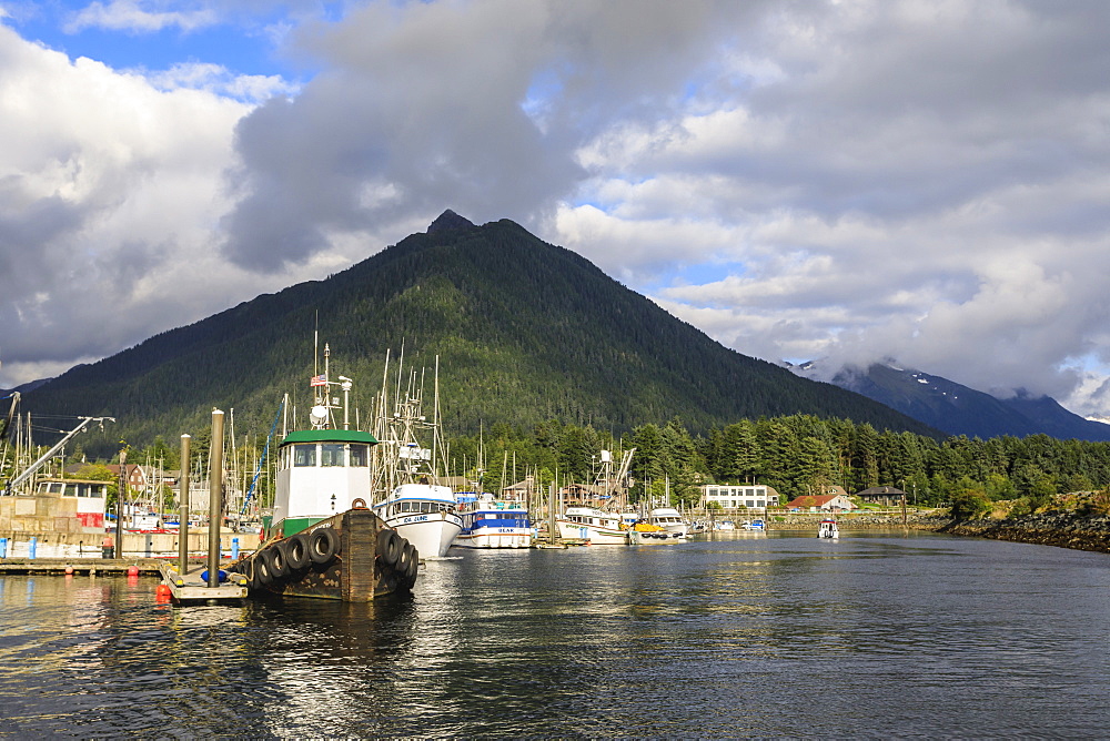 Crescent Boat harbour with beautiful wooded mountains and town of Sitka, rare sunny day, summer, Baranof Island, Alaska, United States of America, North America