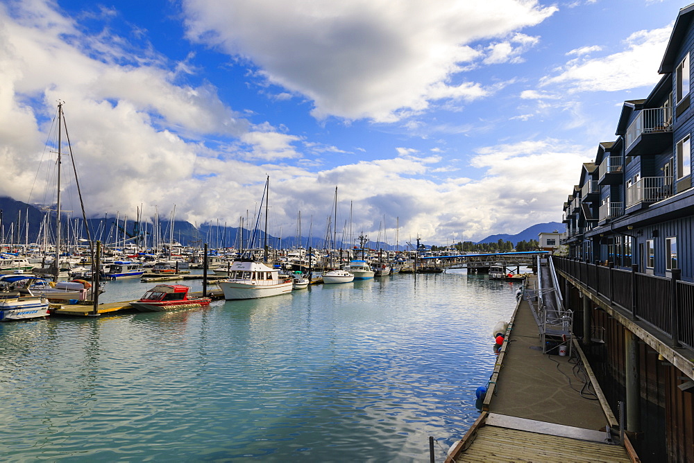 Small Boat Harbour, hotel, small boats and mountains, Seward, Resurrection Bay, Kenai Peninsula, Alaska, United States of America, North America