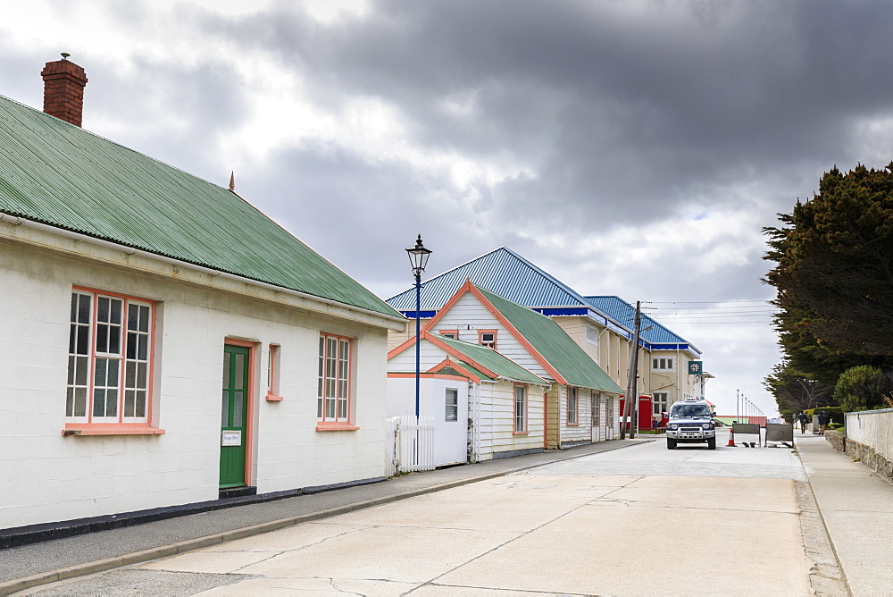 Traditional buildings with pastel iron roofs, Post Office, phone boxes, taxi, Central Stanley, Port Stanley, Falkland Islands, South America