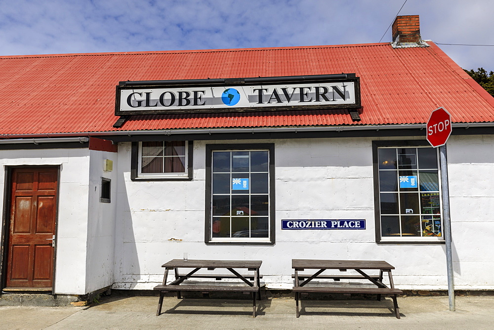 Stop sign and Globe Tavern British Pub, picnic tables, Stanley, Port Stanley, Falkland Islands, South America