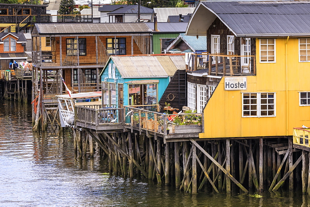 Palafitos, colourful stilt houses on water's edge, unique to Chiloe, Castro, Isla Grande de Chiloe, Chile, South America