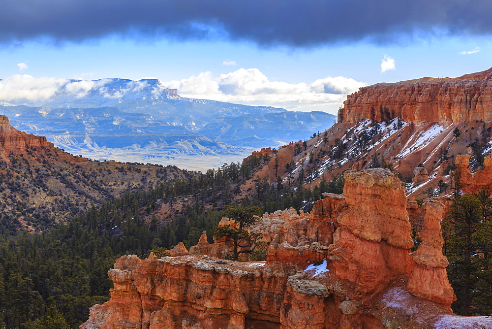 Distant view with cloud layers from elevated position on Peekaboo Loop Trail in winter, Bryce Canyon National Park, Utah, United States of America, North America