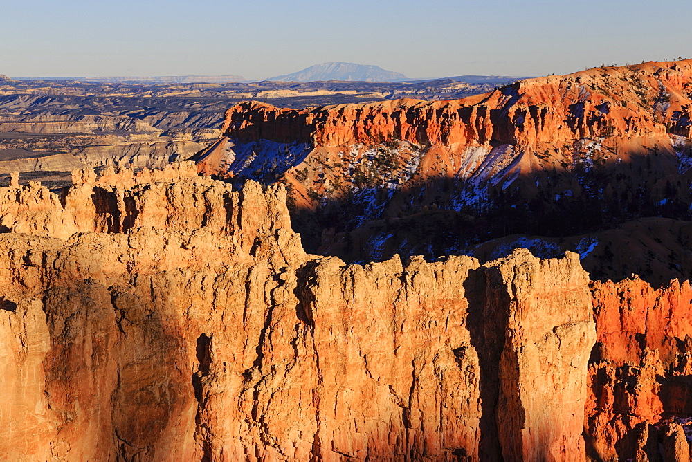 Rocks lit by winter late afternoon sun, from Rim Trail near Sunset Point, Bryce Canyon National Park, Utah, United States of America, North America