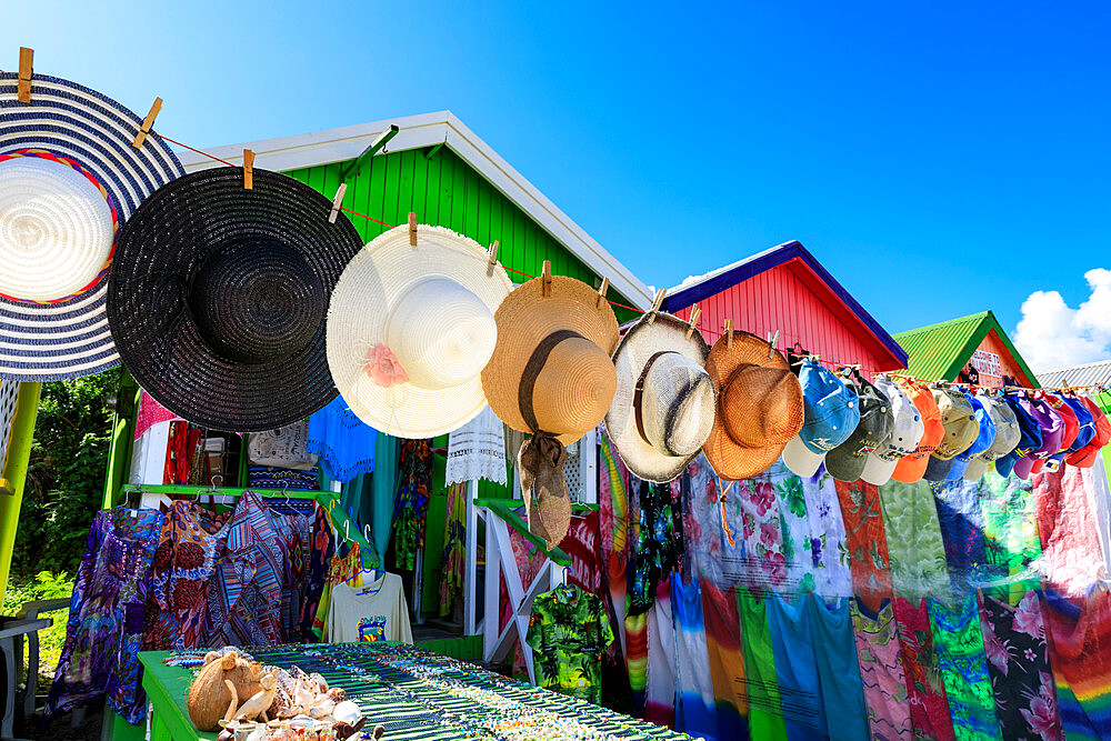 Long Bay Beach, colourful tourist souvenir stall and beach huts, blue sky, Antigua, Antigua and Barbuda, Leeward Islands, West Indies, Caribbean, Central America