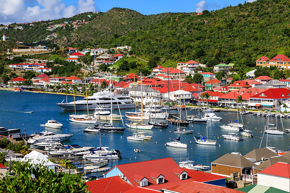 Elevated view, harbour, red rooftops and wooded hills, Gustavia, St. Barthelemy (St. Barts) (St. Barth), West Indies, Caribbean, Central America