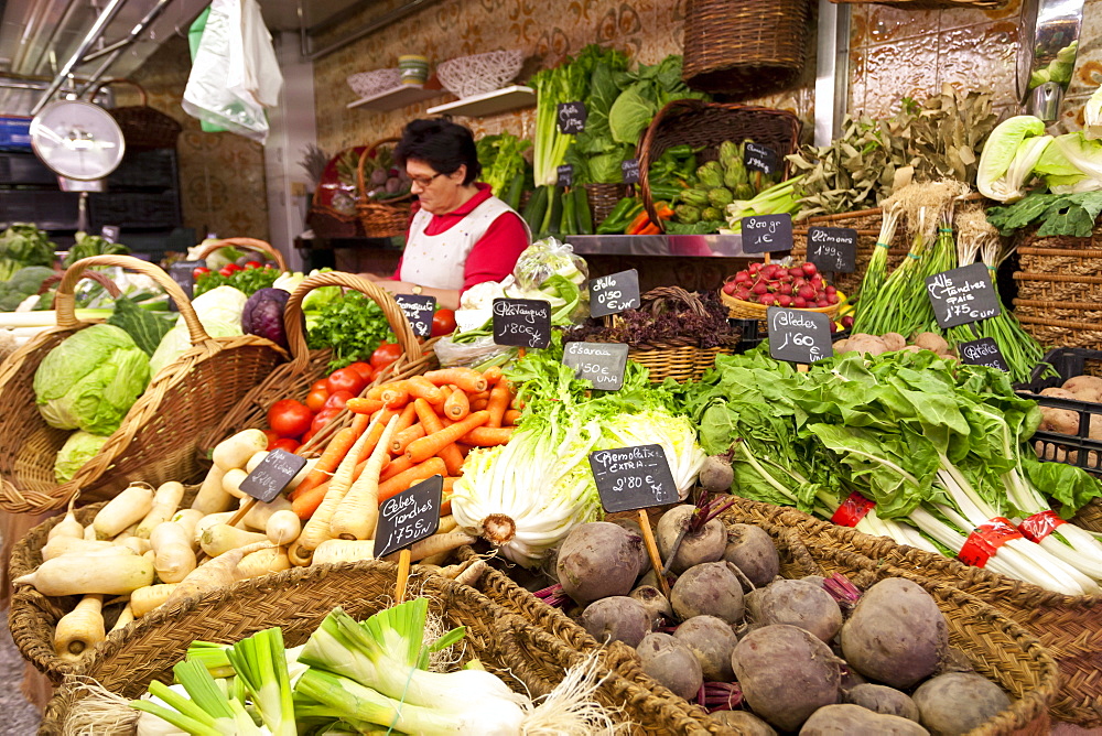 Vegetable stall, Saturday morning at La Boqueria, probably Barcelona's best-known market, off La Rambla, Barcelona, Catalonia, Spain, Europe