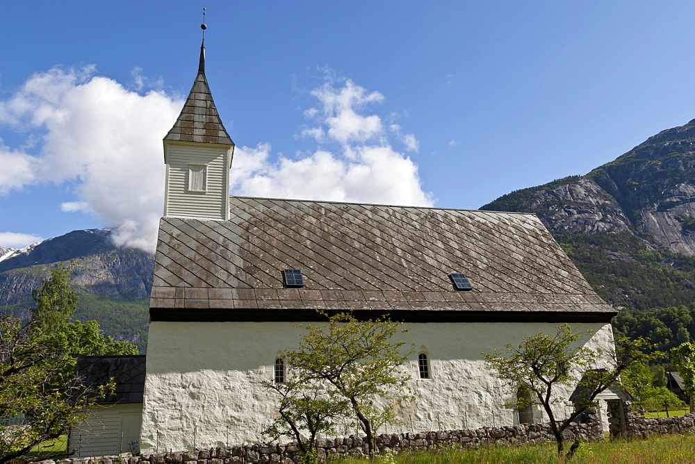 Old Eidfjord Church under a blue sky with a countryside setting, Eidfjord, Hordaland, Hardanger, Norway, Scandinavia, Europe