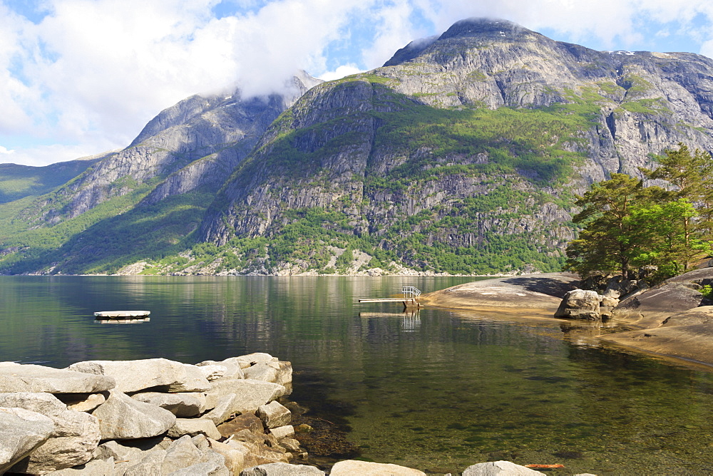 Eidfjord diving board, bathing platform and mountains on a sunny day, Eidfjorden, Hordaland, Hardanger, Norway, Scandinavia, Europe