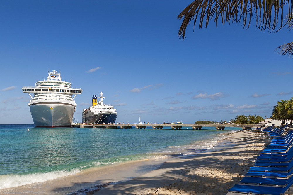 Cruise ships and disembarking passengers, seen from the cruise terminal beach, Grand Turk, Turks and Caicos, West Indies, Caribbean, Central America