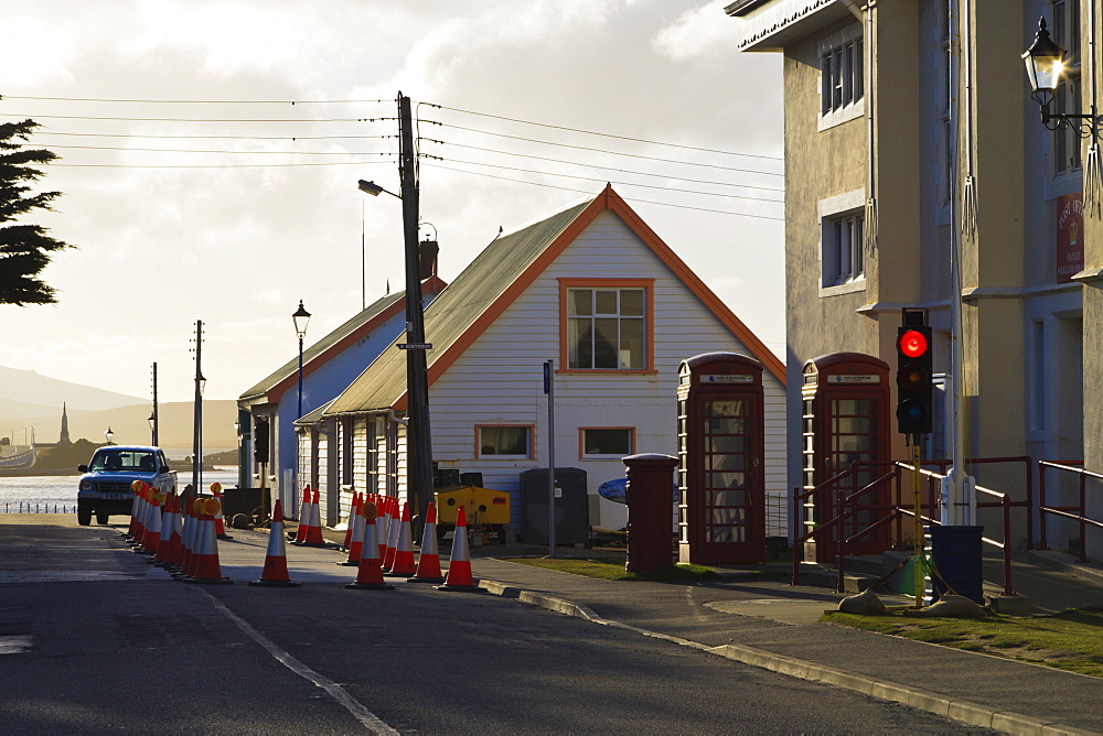 Post office, red telephone boxes, cones and traffic light, waterfront, Stanley, East Falkland, Falkland Islands, South America 