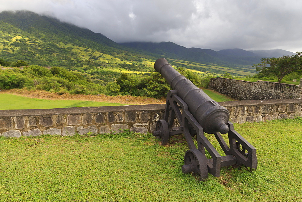 Cannon and green hills, Brimstone Hill Fortress, UNESCO World Heritage Site, St. Kitts, St. Kitts and Nevis, West Indies, Caribbean, Central America