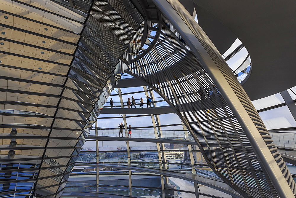 Reichstag dome interior with engaged visitors, early morning, Mitte, Berlin, Germany, Europe