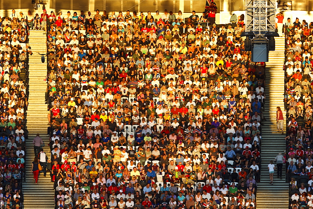 Crowd lit by evening sun, Olympic Stadium, London 2012 Olympic Games, London, England, United Kingdom, Europe 