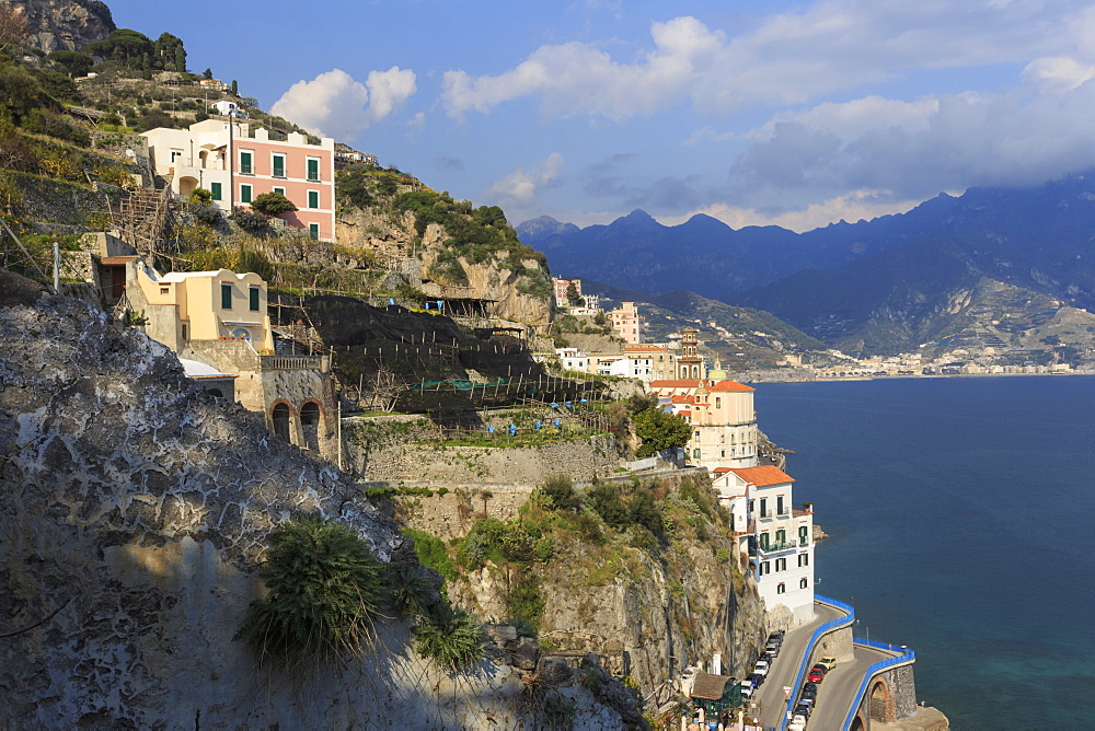 Cliff side view towards Atrani and distant Maiori, Costiera Amalfitana (Amalfi Coast), UNESCO World Heritage Site, Campania, Italy, Europe