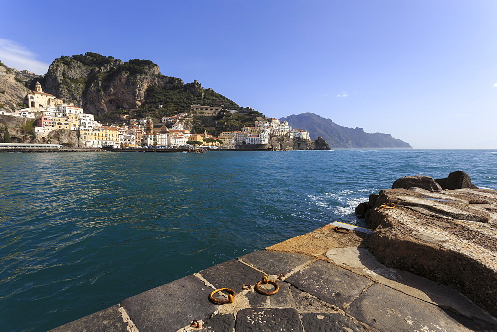 Amalfi harbour quayside and view towards Amalfi town, Costiera Amalfitana (Amalfi Coast), UNESCO World Heritage Site, Campania, Italy, Europe