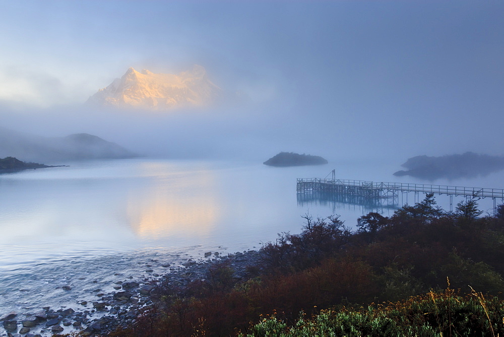 Reflection in the clearing fog, Lago Pehoe, Torres del Paine National Park, Patagonia, Chile, South America 