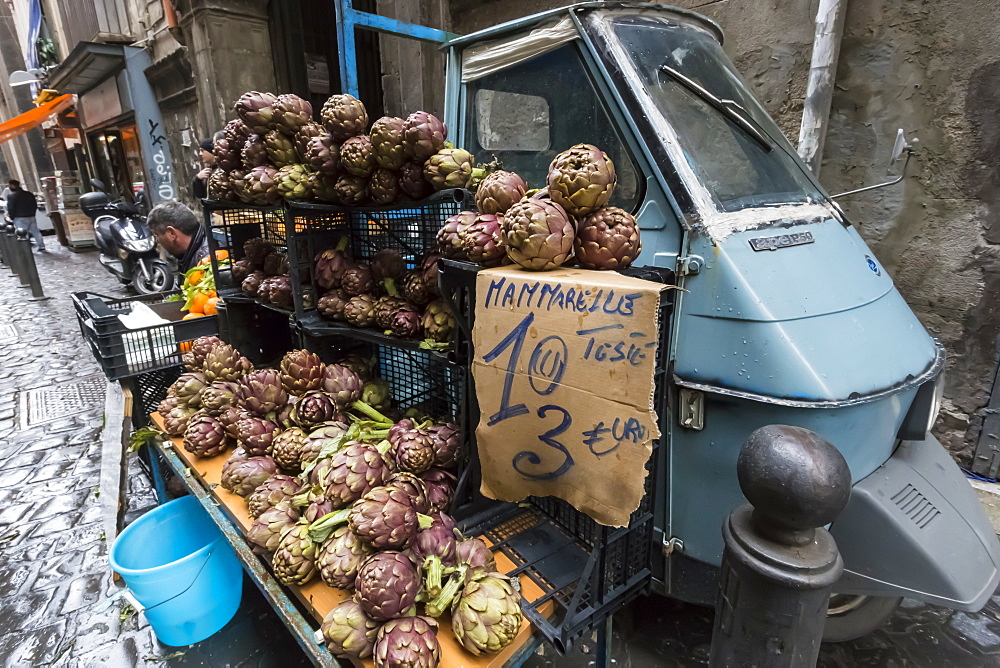 Local artichokes for sale from Piaggio van, Historic Centre (Centro Storico), UNESCO World Heritage Site, Naples, Campania, Italy, Europe