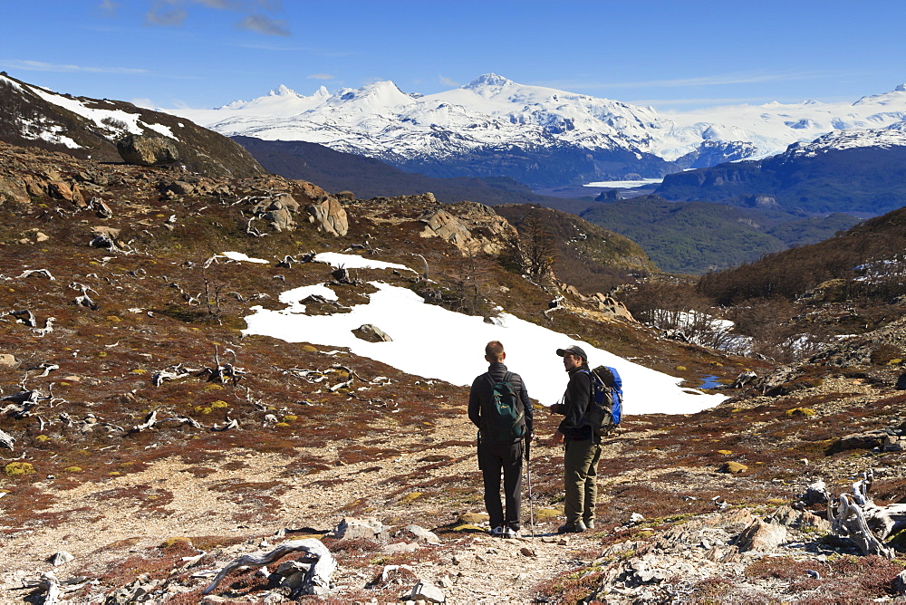 Hikers take a break from walking, trail to Ferrier Vista Point, Torres del Paine, Patagonia, Chile, South America 