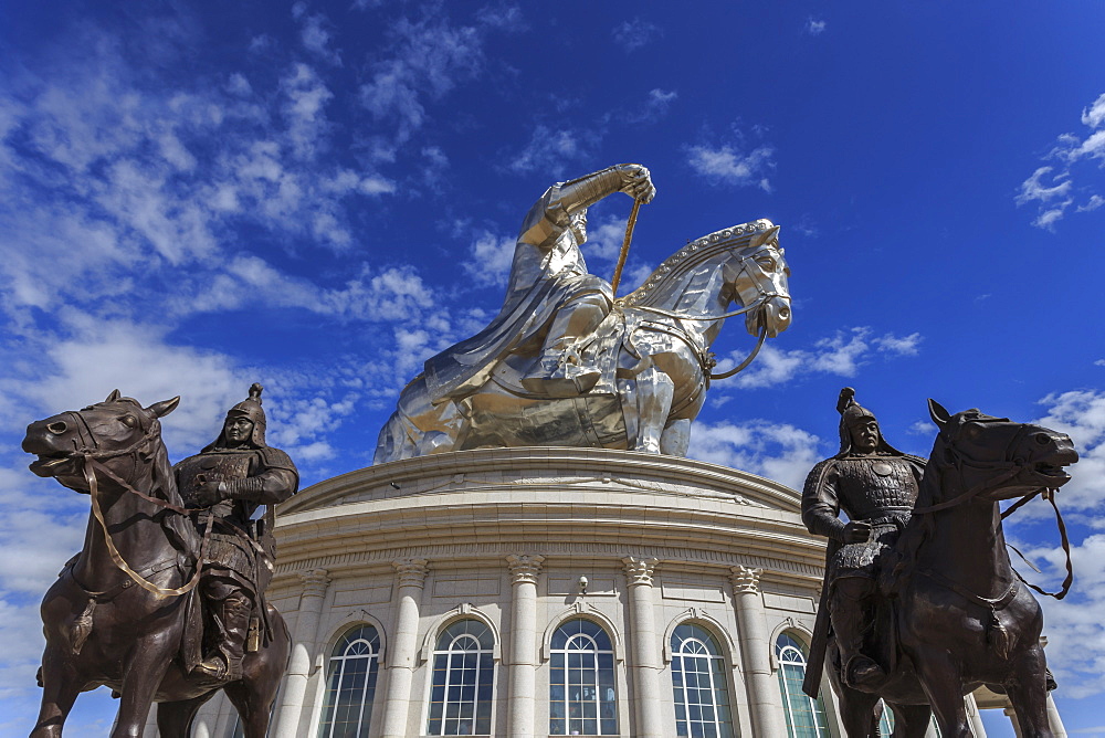 Huge silver stainless steel Chinggis Khaan (Genghis Khan) statue with blue sky, Tsonjin Boldog, Tov Province, Central Mongolia, Central Asia, Asia