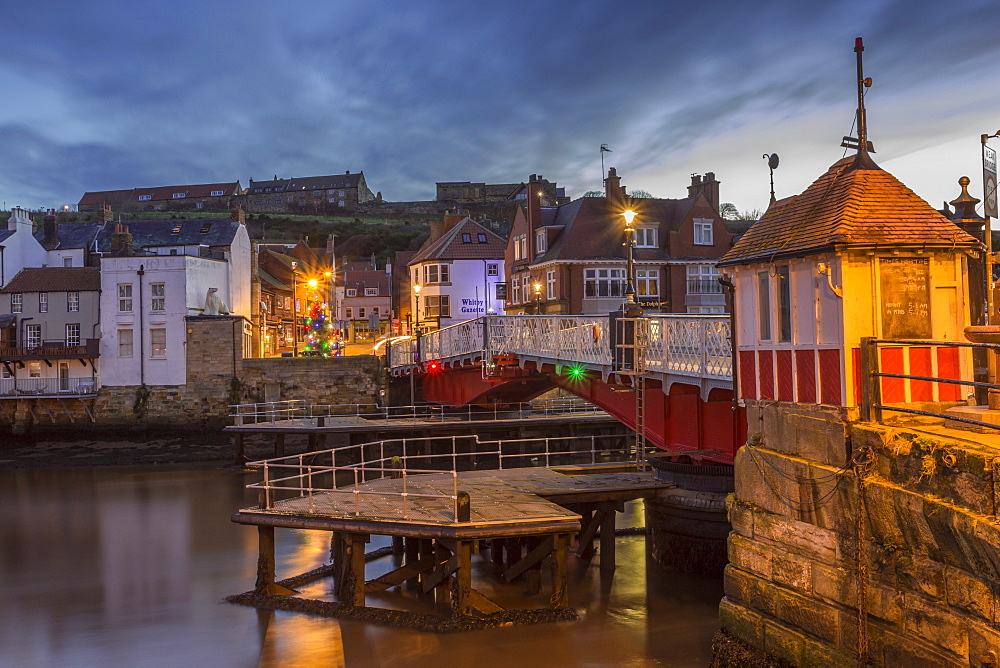 Old Swing Bridge over River Esk at dawn during the Christmas holidays, Whitby, North Yorkshire, England, United Kingdom, Europe