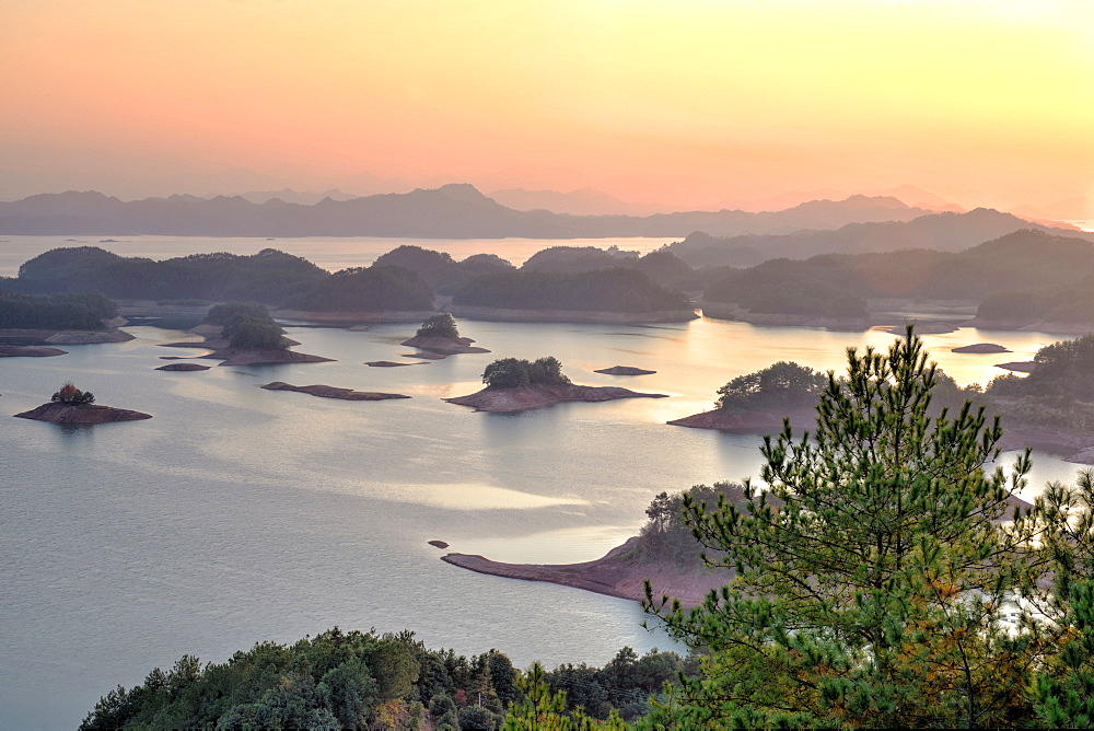 Islands at sunset at Qiandaohu, 1000 Islands Lake, Lijiang, Yunnan, China, Asia 