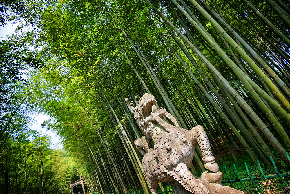 Stone Qi Ling statue, a mythical lion, at YunQi Bamboo Forest in Hangzhou, Zhejiang, China, Asia 