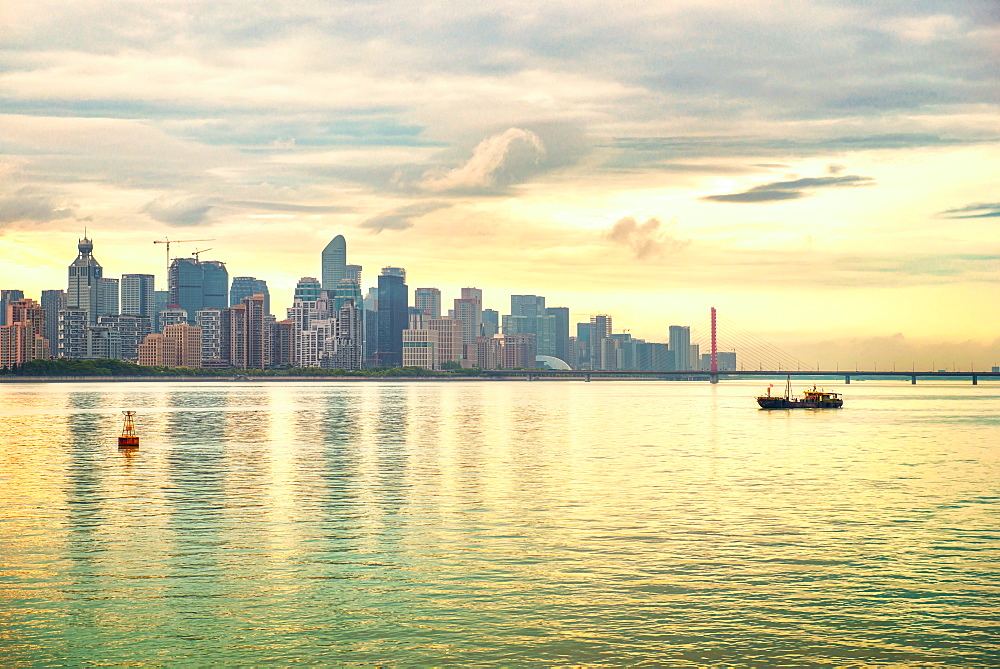 Ever-developing Jianggang skyline and Qianjiang River in Hangzhou, Zhejiang, China, Asia