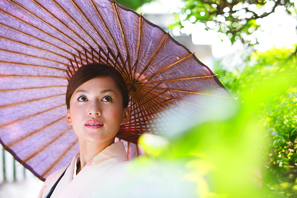 Japanese Woman in Kimono with Bangasa Parasol