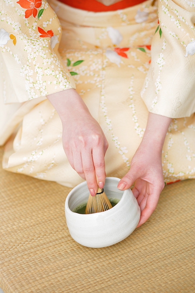 Woman Preparing Herbal Tea