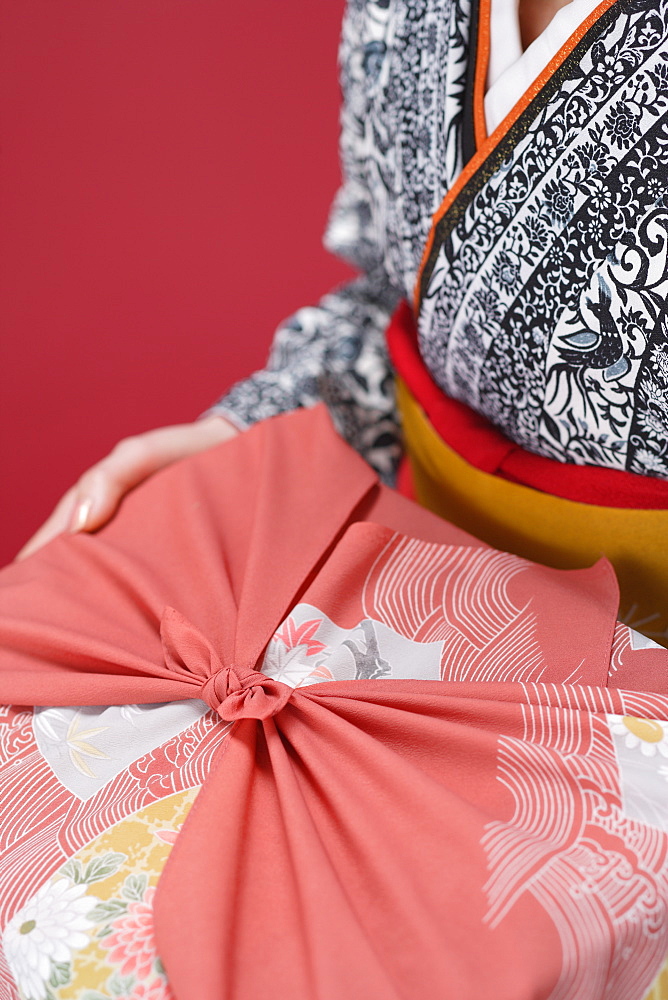 Midsection of Woman Holding Furoshiki